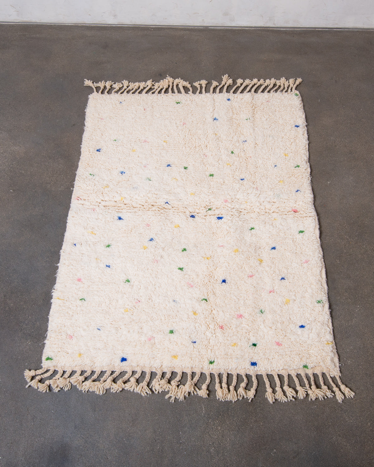 Modern, designer, handcrafted Berber rug from Morocco. Beniourain carpet with beautiful colours and patterns and fluffy wool texture.